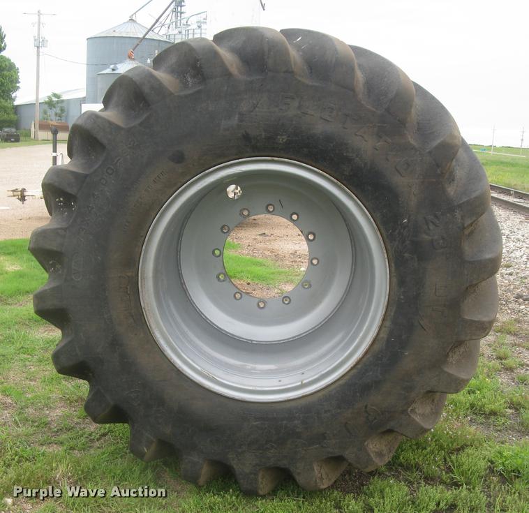 image for item AR9868 Firestone 73x44.00-32 floater tire and wheel