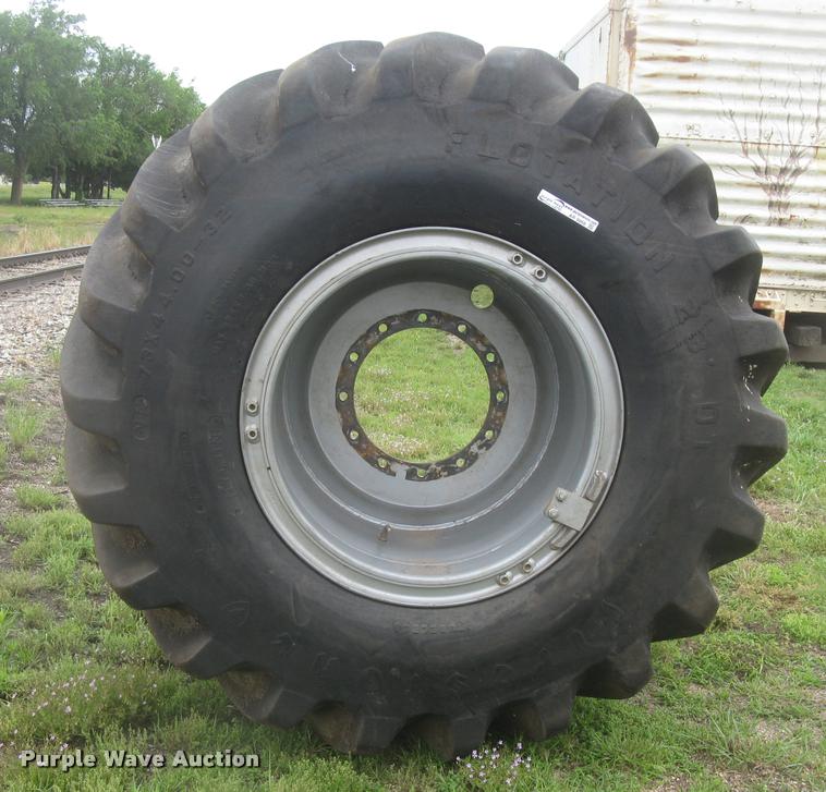 image for item AR9868 Firestone 73x44.00-32 floater tire and wheel