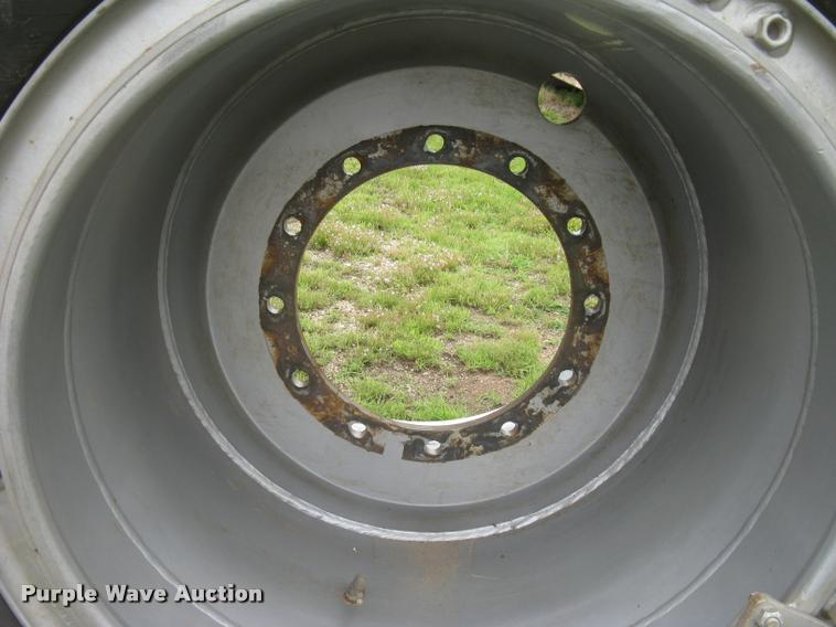 image for item AR9868 Firestone 73x44.00-32 floater tire and wheel