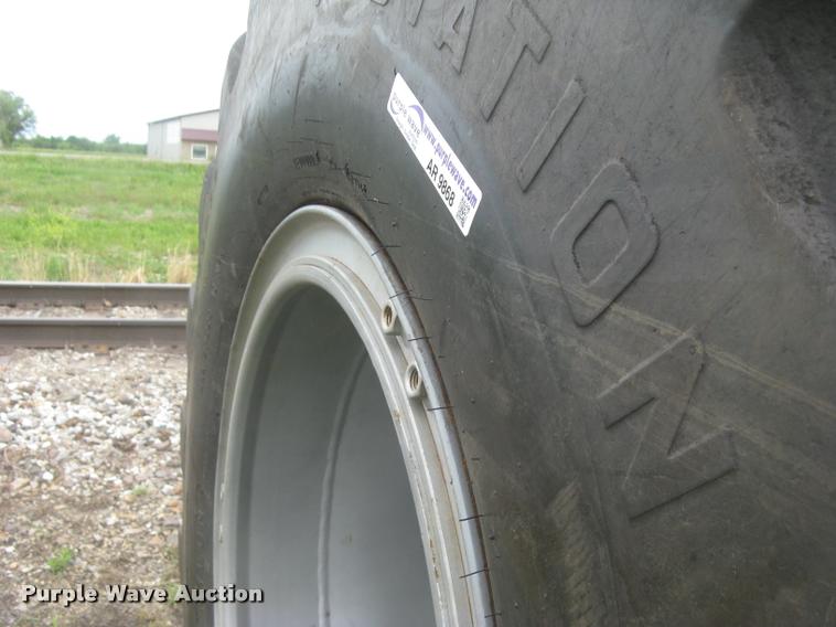 image for item AR9868 Firestone 73x44.00-32 floater tire and wheel