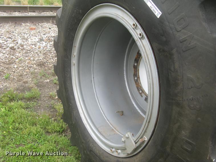 image for item AR9868 Firestone 73x44.00-32 floater tire and wheel