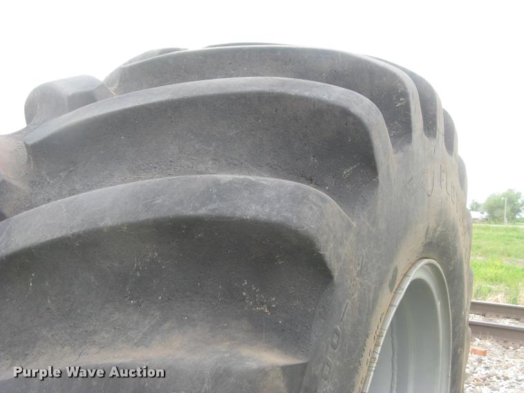 image for item AR9868 Firestone 73x44.00-32 floater tire and wheel