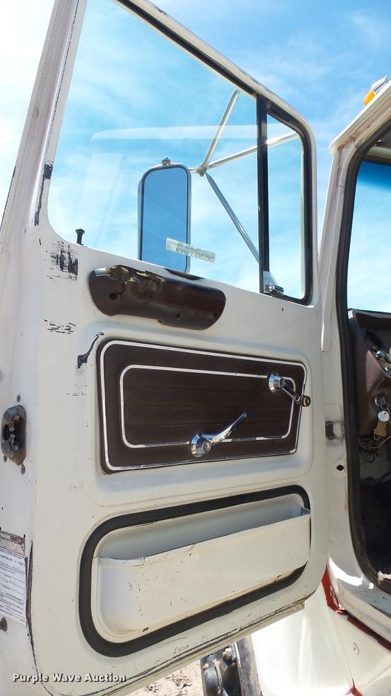 image for item DO9746 1977 Ford 7000 flatbed truck with crane