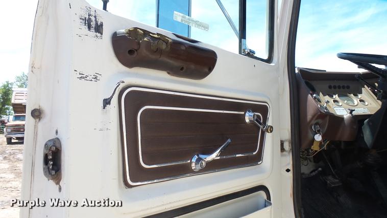 image for item DO9746 1977 Ford 7000 flatbed truck with crane