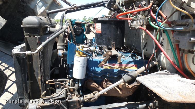 image for item DO9746 1977 Ford 7000 flatbed truck with crane