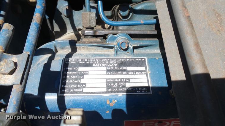 image for item DO9746 1977 Ford 7000 flatbed truck with crane