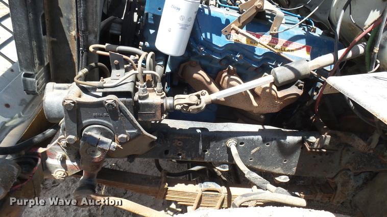 image for item DO9746 1977 Ford 7000 flatbed truck with crane