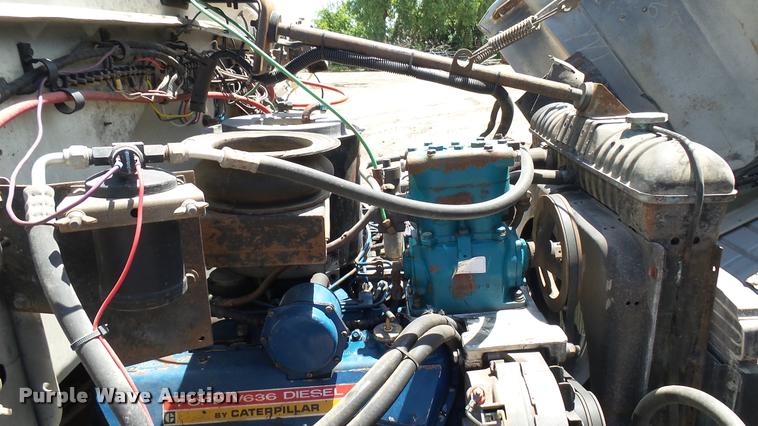 image for item DO9746 1977 Ford 7000 flatbed truck with crane