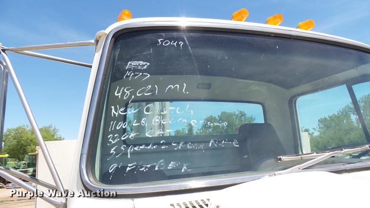 image for item DO9746 1977 Ford 7000 flatbed truck with crane