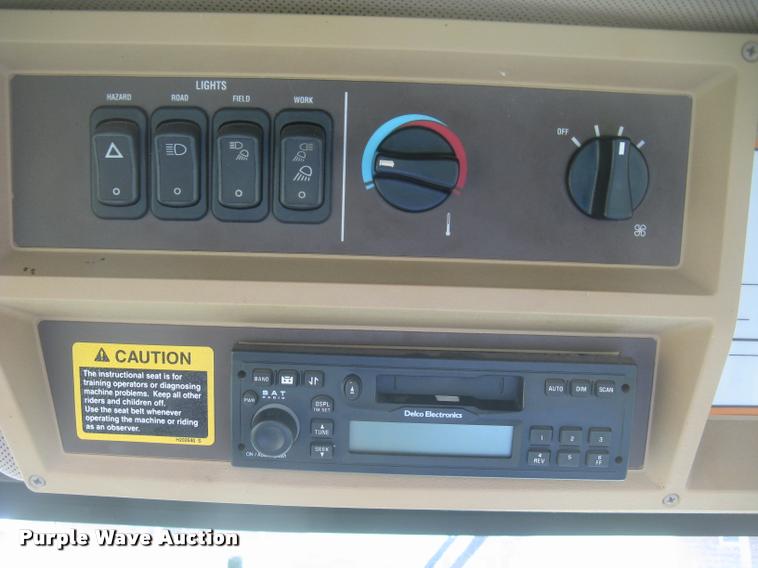 image for item L2343 2002 John Deere 4895 self-propelled windrower