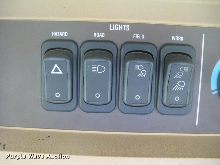 image for item L2343 2002 John Deere 4895 self-propelled windrower