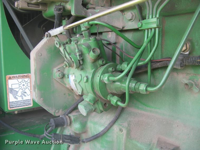 image for item L2343 2002 John Deere 4895 self-propelled windrower