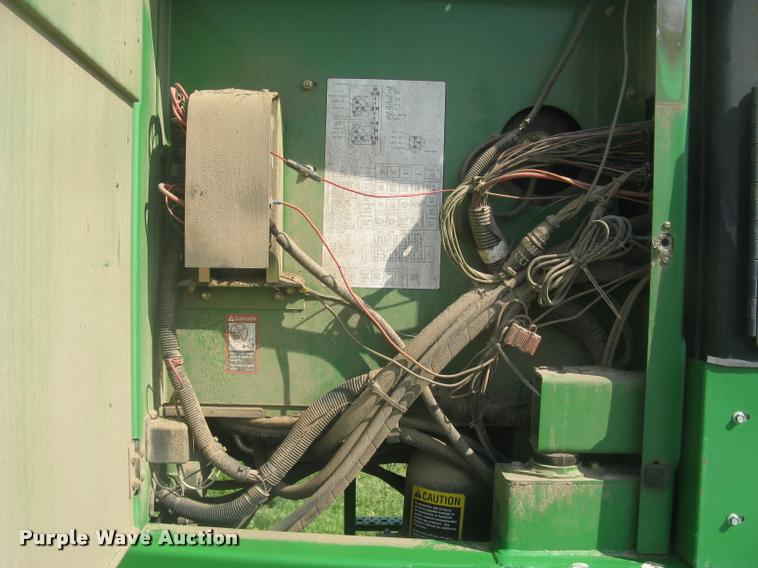 image for item L2343 2002 John Deere 4895 self-propelled windrower