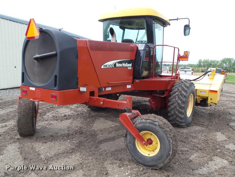 image for item L5553 2006 New Holland HW345 self-propelled windrower