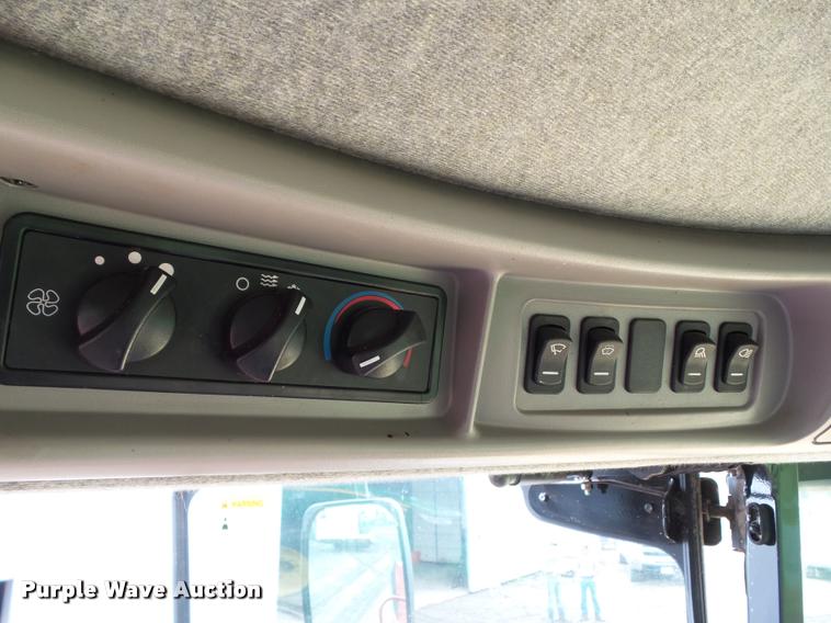 image for item L5553 2006 New Holland HW345 self-propelled windrower