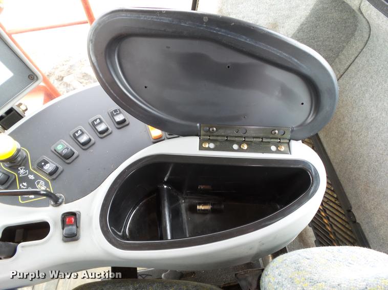 image for item L5553 2006 New Holland HW345 self-propelled windrower