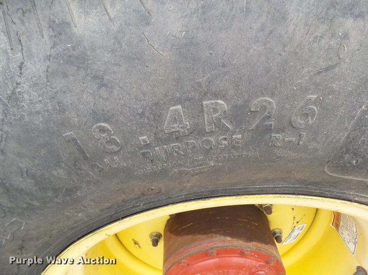 image for item L5553 2006 New Holland HW345 self-propelled windrower