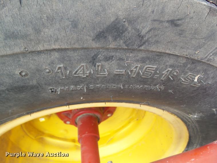 image for item L5553 2006 New Holland HW345 self-propelled windrower