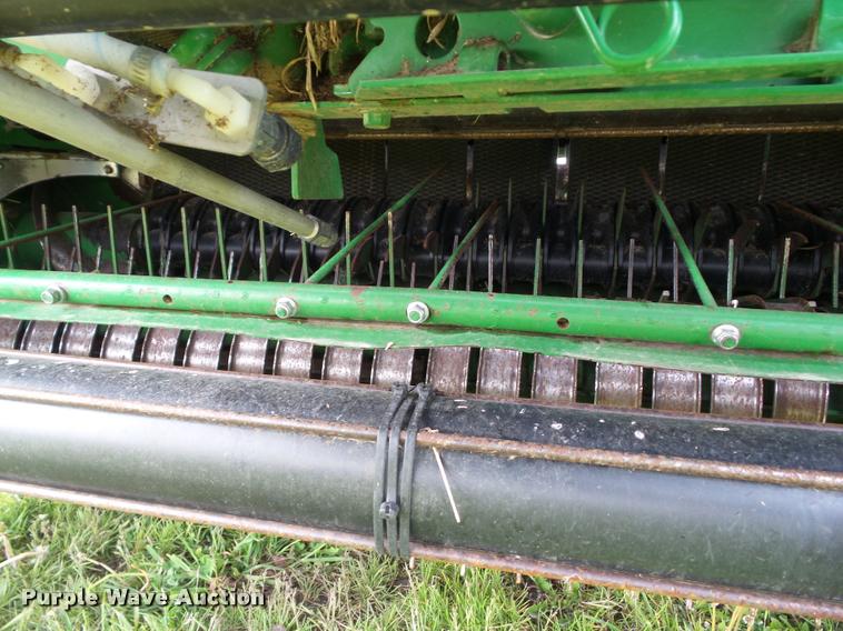 image for item L5554 2012 John Deere 568 Mega Wide Plus round baler