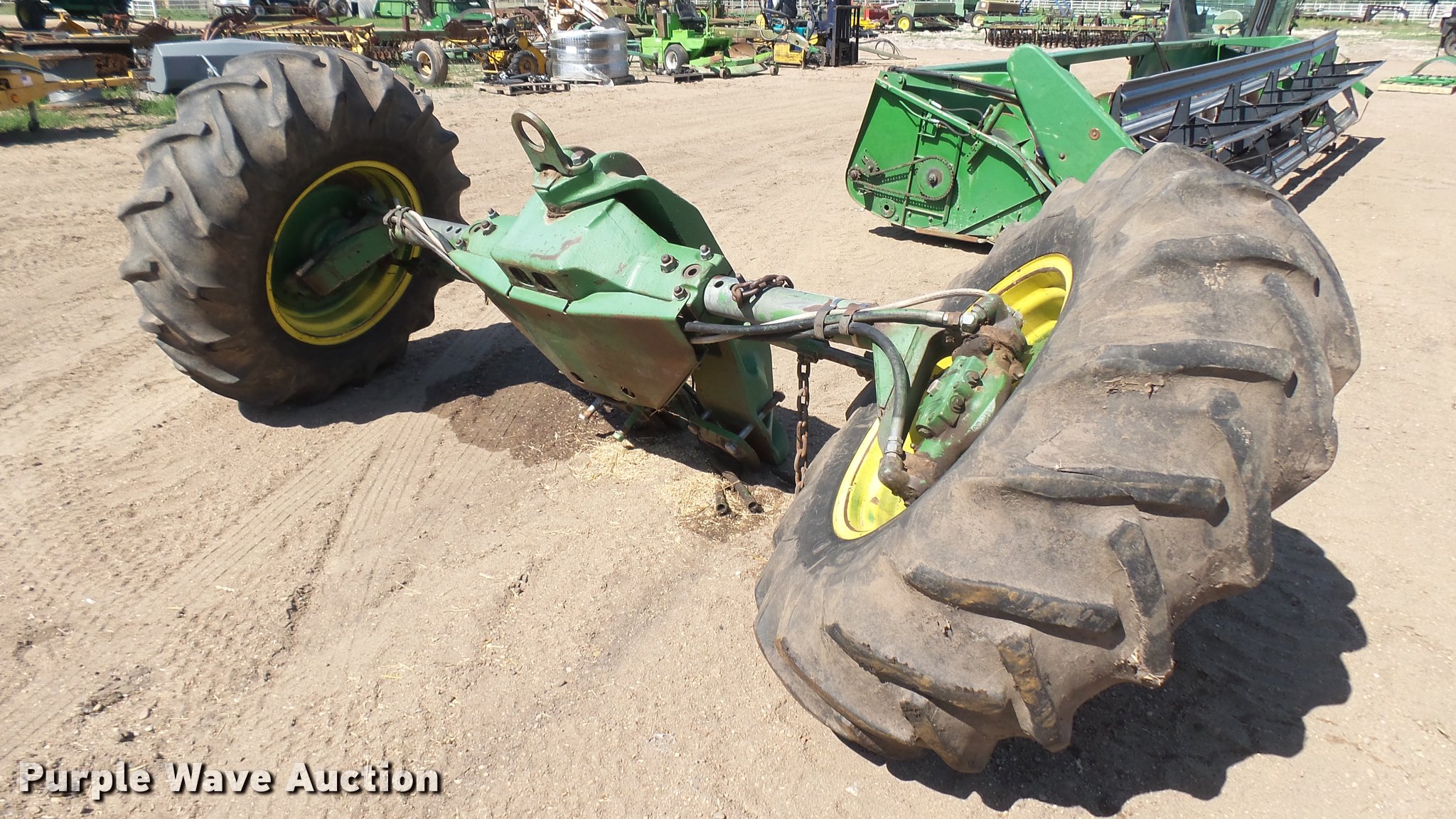 John Deere combine rear axle and wheels in Kinsley, KS Item DO9607