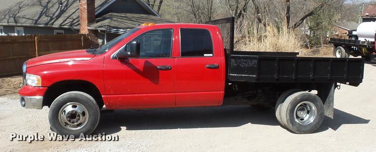 image for item BH9305 2005 Dodge Ram 3500 Quad Cab flatbed pickup truck