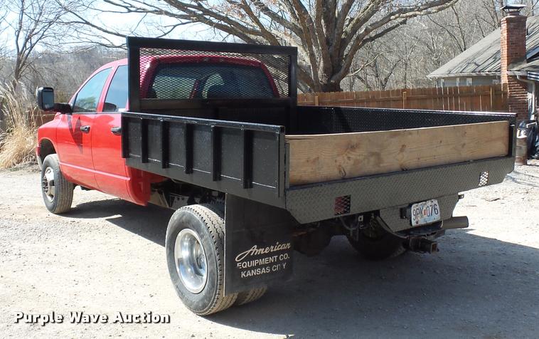 image for item BH9305 2005 Dodge Ram 3500 Quad Cab flatbed pickup truck