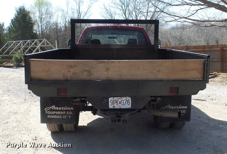image for item BH9305 2005 Dodge Ram 3500 Quad Cab flatbed pickup truck