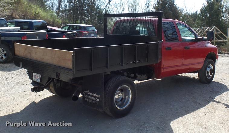 image for item BH9305 2005 Dodge Ram 3500 Quad Cab flatbed pickup truck