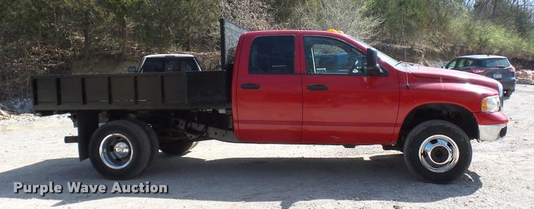 image for item BH9305 2005 Dodge Ram 3500 Quad Cab flatbed pickup truck
