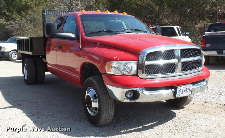 image for item BH9305 2005 Dodge Ram 3500 Quad Cab flatbed pickup truck