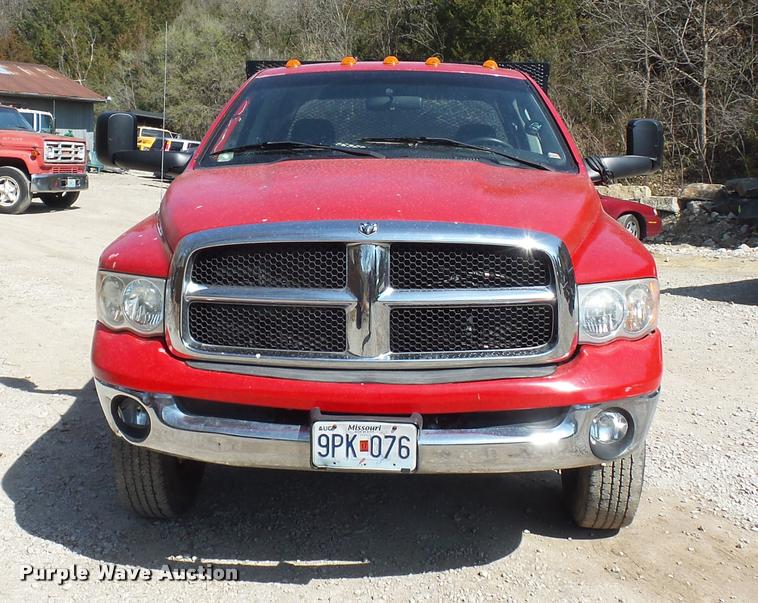 image for item BH9305 2005 Dodge Ram 3500 Quad Cab flatbed pickup truck