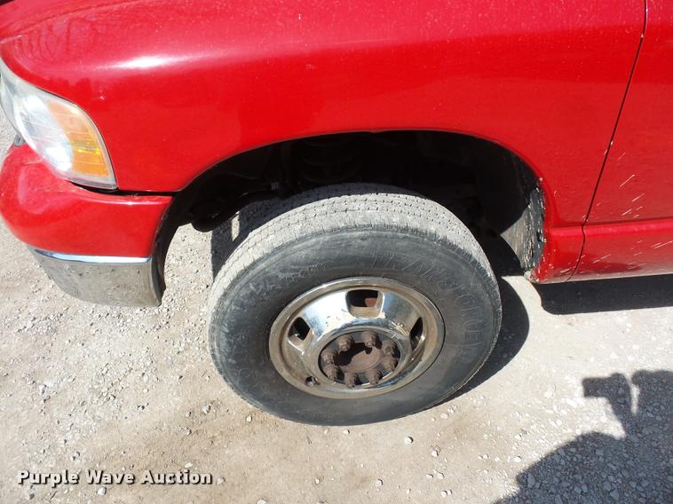 image for item BH9305 2005 Dodge Ram 3500 Quad Cab flatbed pickup truck