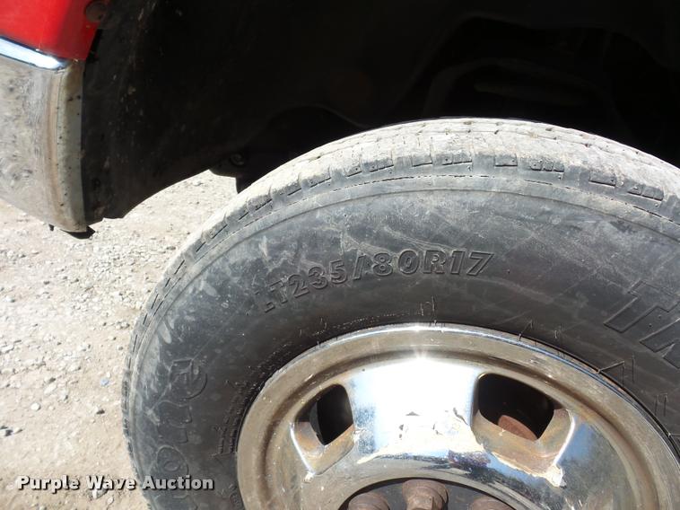 image for item BH9305 2005 Dodge Ram 3500 Quad Cab flatbed pickup truck