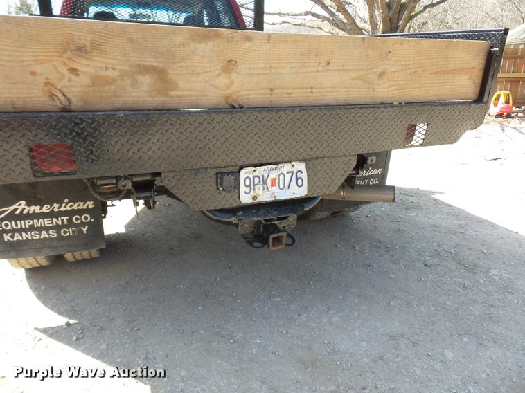 image for item BH9305 2005 Dodge Ram 3500 Quad Cab flatbed pickup truck