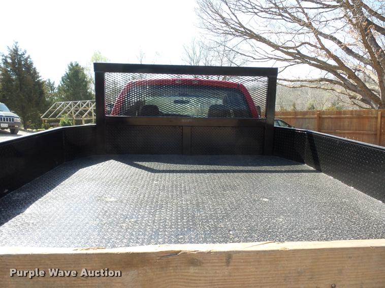 image for item BH9305 2005 Dodge Ram 3500 Quad Cab flatbed pickup truck