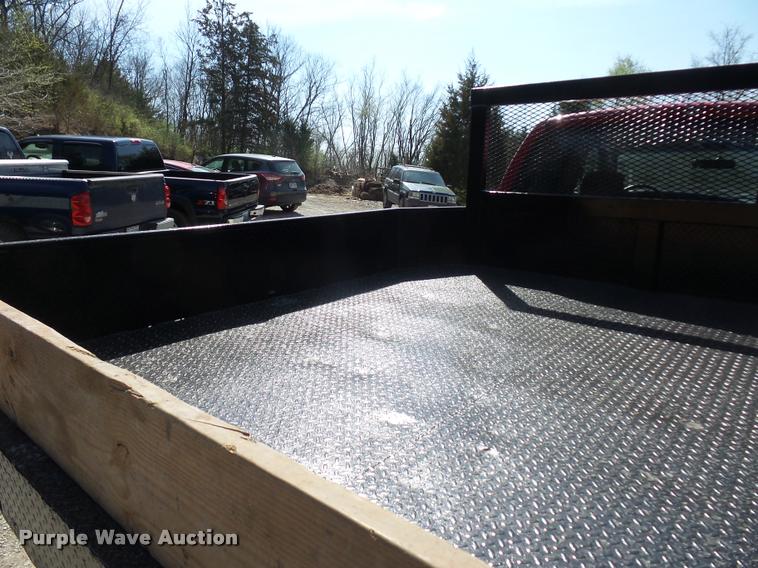 image for item BH9305 2005 Dodge Ram 3500 Quad Cab flatbed pickup truck