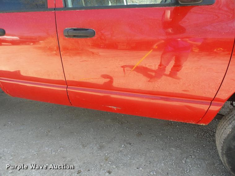 image for item BH9305 2005 Dodge Ram 3500 Quad Cab flatbed pickup truck