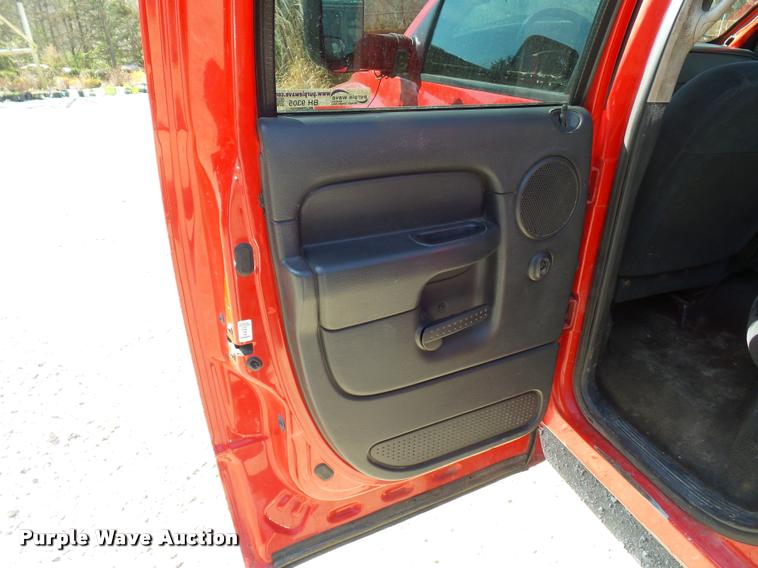 image for item BH9305 2005 Dodge Ram 3500 Quad Cab flatbed pickup truck