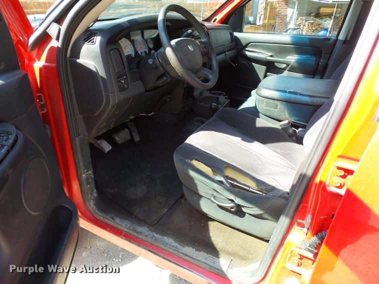 image for item BH9305 2005 Dodge Ram 3500 Quad Cab flatbed pickup truck