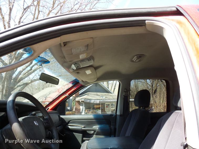 image for item BH9305 2005 Dodge Ram 3500 Quad Cab flatbed pickup truck