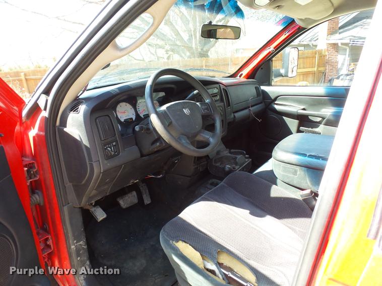 image for item BH9305 2005 Dodge Ram 3500 Quad Cab flatbed pickup truck