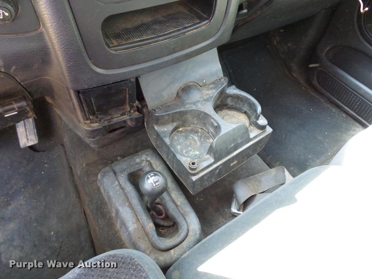 image for item BH9305 2005 Dodge Ram 3500 Quad Cab flatbed pickup truck