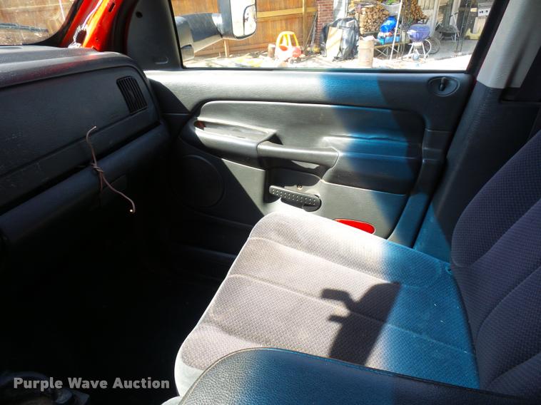 image for item BH9305 2005 Dodge Ram 3500 Quad Cab flatbed pickup truck