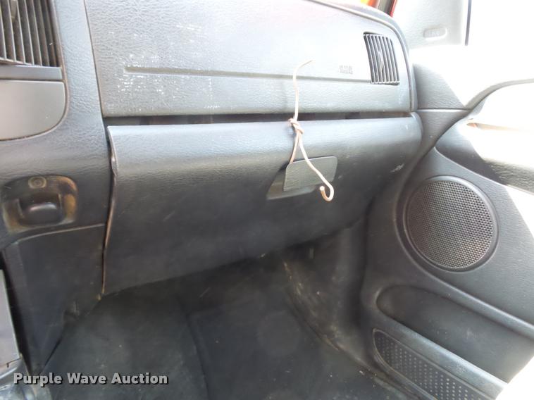 image for item BH9305 2005 Dodge Ram 3500 Quad Cab flatbed pickup truck