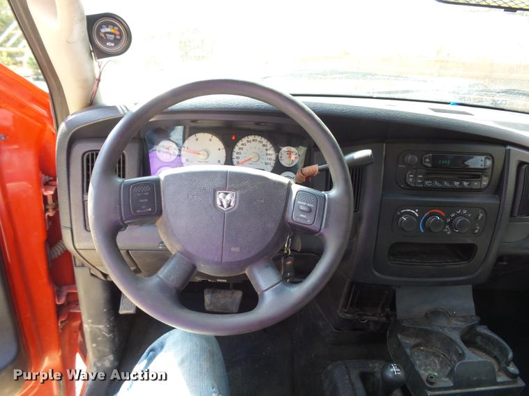 image for item BH9305 2005 Dodge Ram 3500 Quad Cab flatbed pickup truck