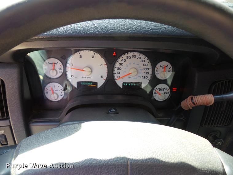 image for item BH9305 2005 Dodge Ram 3500 Quad Cab flatbed pickup truck