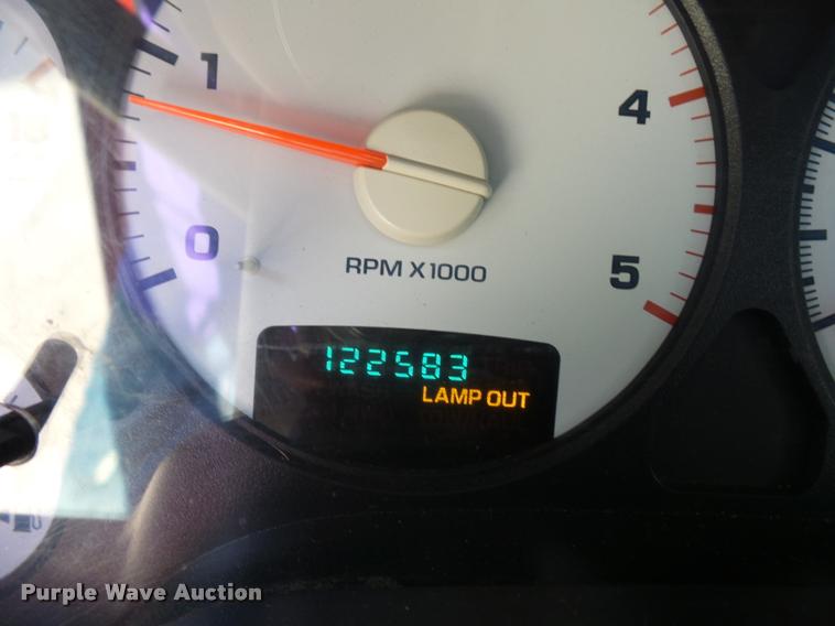 image for item BH9305 2005 Dodge Ram 3500 Quad Cab flatbed pickup truck