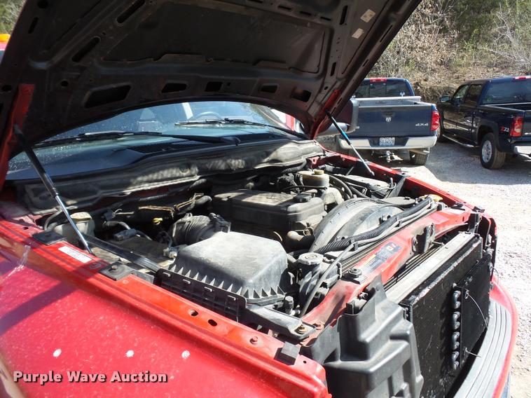 image for item BH9305 2005 Dodge Ram 3500 Quad Cab flatbed pickup truck