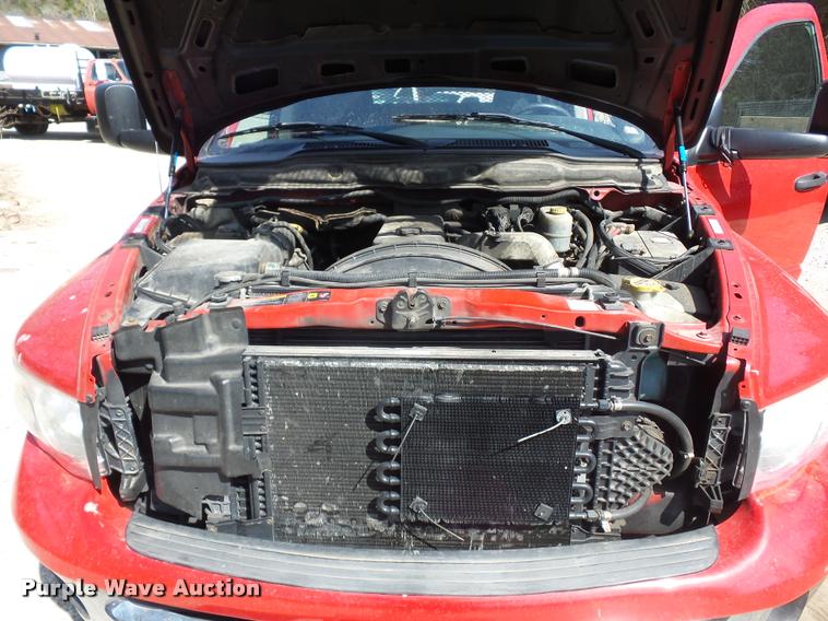 image for item BH9305 2005 Dodge Ram 3500 Quad Cab flatbed pickup truck