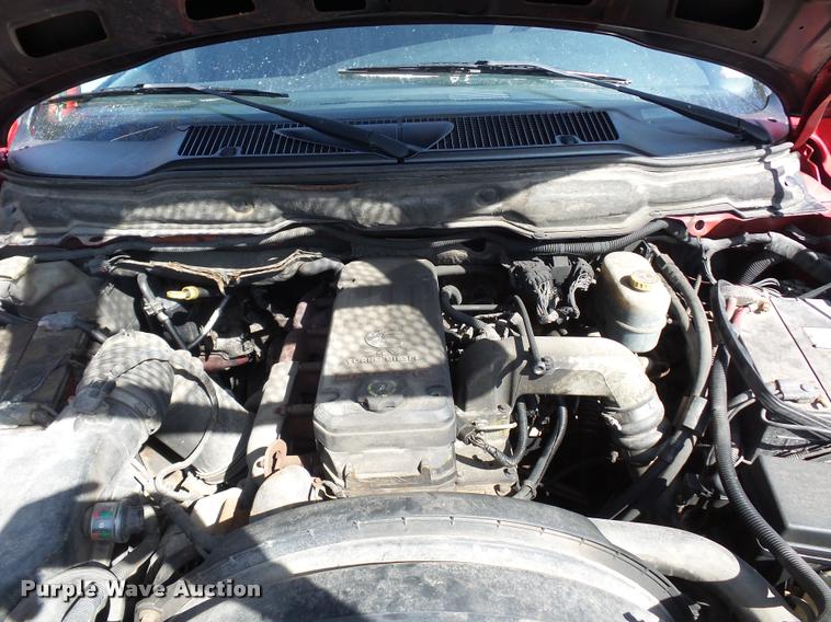 image for item BH9305 2005 Dodge Ram 3500 Quad Cab flatbed pickup truck